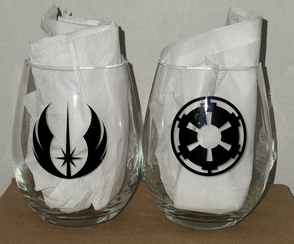 Embrace the duality of the Force with this striking set of two (2) Star Wars-the